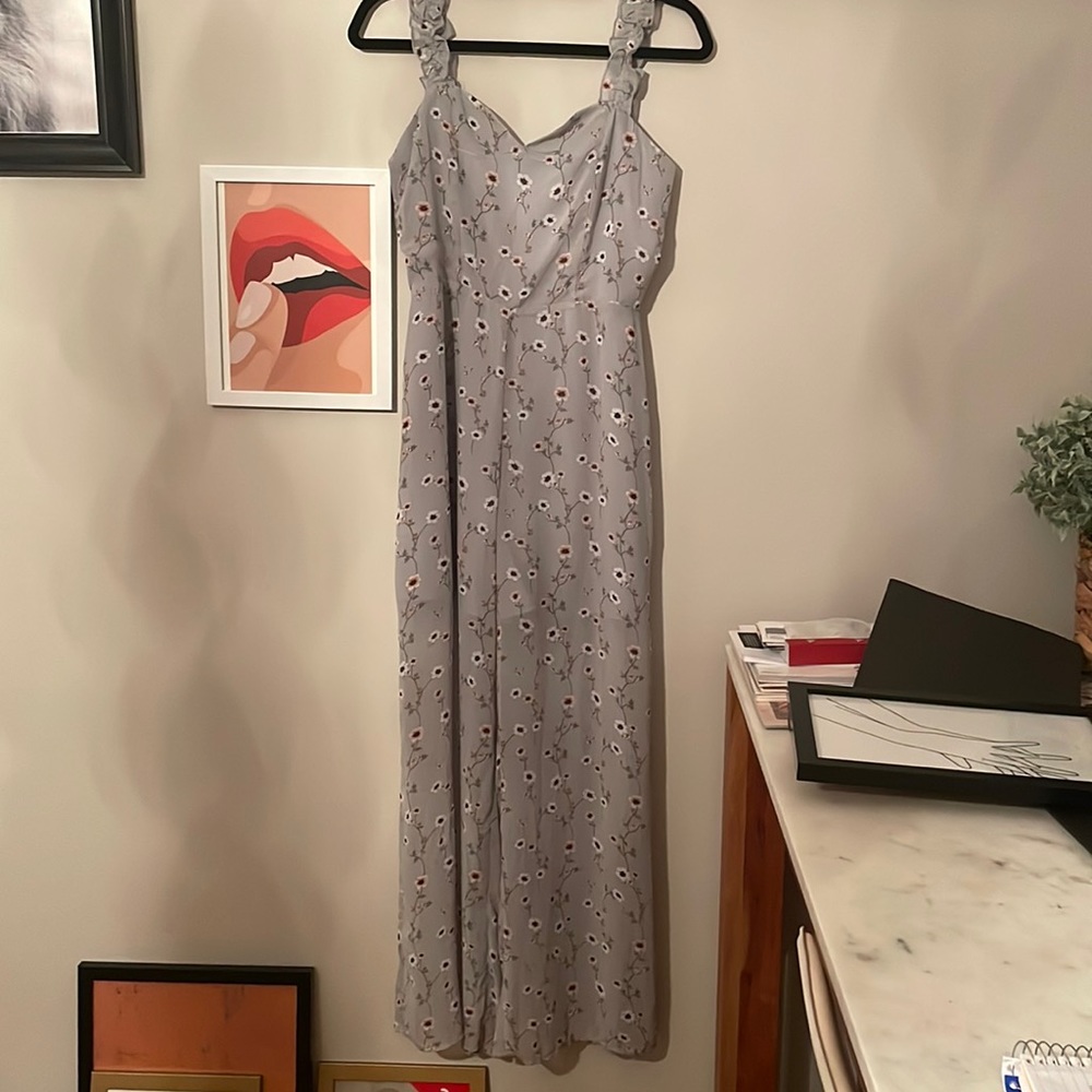 Francesca’s blue floral jumpsuit. Size SM. New with tags. No stains or tears.